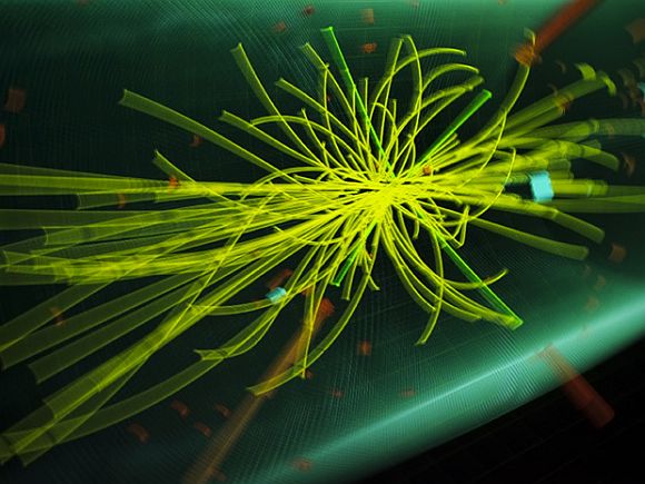 A graphic showing traces of collision of particles at the Compact Muon Solenoid (CMS) experience is pictured with a slow speed experience at Universe of Particles exhibition of CERN