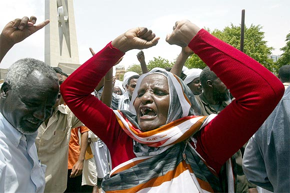 A supporter of Sudan's President Omar Hassan al-Bashir demonstrates against the International Criminal Court's arrest warrant for Bashir in Khartoum