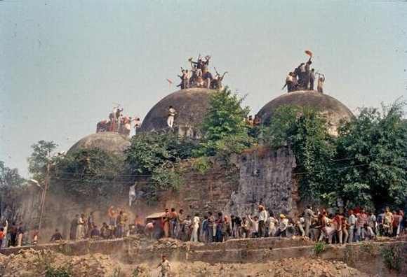 Mobs demolish the Babri Masjid in Ayodhya, December 6, 1992.