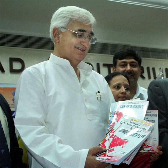 Salman Khurshid flexes his muscles