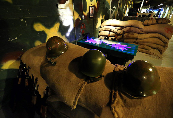 Dine amid landmines, ammo at China's military bar