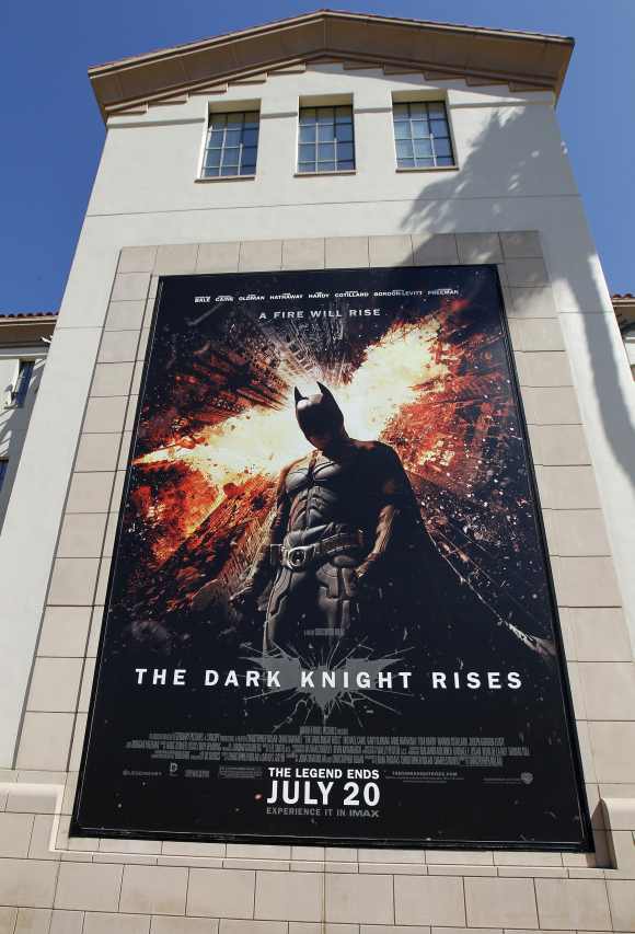 A poster for the Warner Bros film 'The Dark Knight Rises; is displayed at Warner Bros. studios in Burbank, California