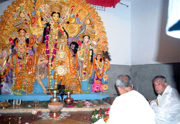 File photo of Pranab taking part in the Durga Puja ceremony at his ancestral village