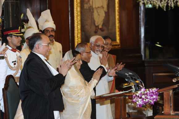 Mukherjee with outgoing President Pratibha Devisingh Patil, Vice President Mohd Hamid Ansari, Speaker Meira Kumar and Chief Justice of India S H Kapadia at the swearing-in ceremony in the Central Hall of Parliament