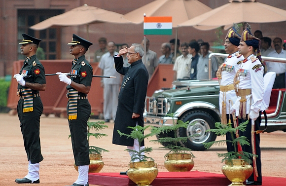 President Shri Pranab Mukherjee inspecting the Guard of Honour after the swearing-in ceremony