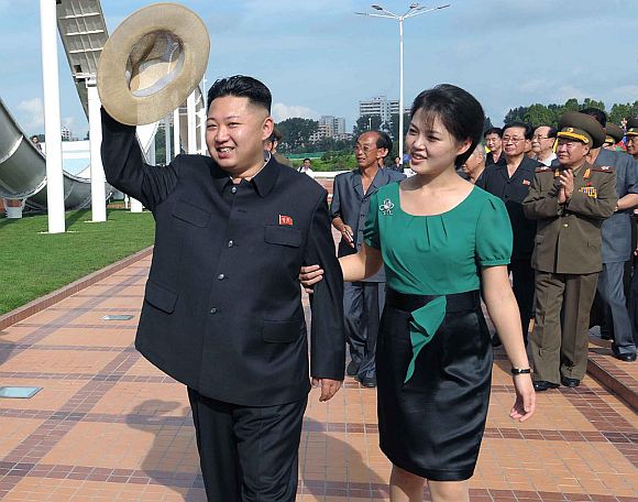 North Korean leader Kim Jong-Un and his wife Ri Sol-Ju attend the opening ceremony of the Rungna People's Pleasure Ground on Rungna Islet along the Taedong River in Pyongyang in this July 25, 2012 photograph released by the North's KCNA to Reuters