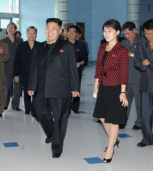 North Korean leader Kim Jong-Un and his wife, who was named by the state broadcaster as Ri Sol-ju, visit the Rungna People's Pleasure Ground in Pyongyang