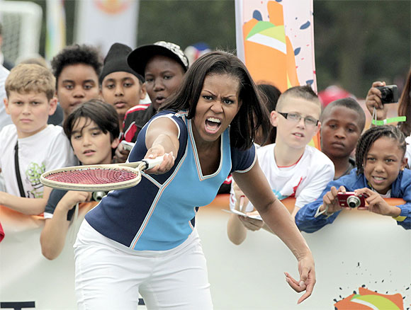 Michelle Obama plays tug of war, football in London