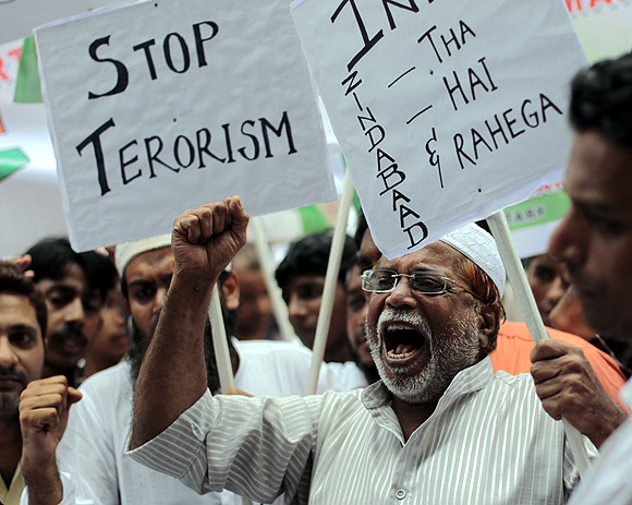 Protestors take part in a rally against terrorism in Mumbai