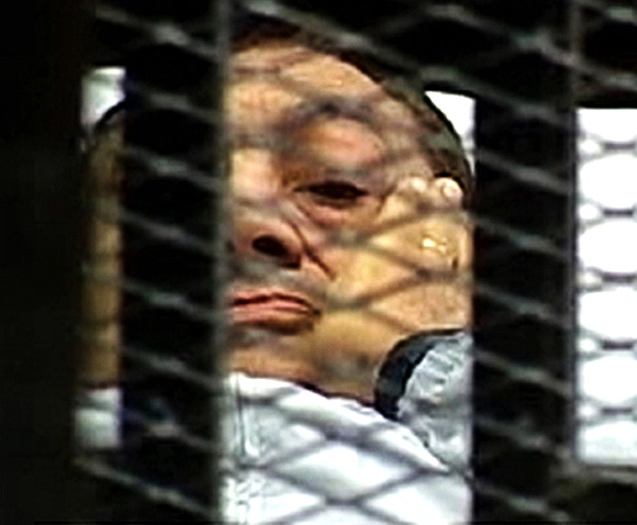 Former Egyptian President Hosni Mubarak is seen in the courtroom for his trial
