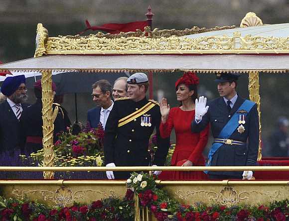 Britain's Prince William and Catherine, Duchess of Cambridge board the Spirit of Chartwell for Queen Elizabeth's Diamond Jubilee River Pageant on the River Thames, in London