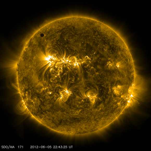 Handout image courtesy of NASA shows the planet Venus transiting the Sun