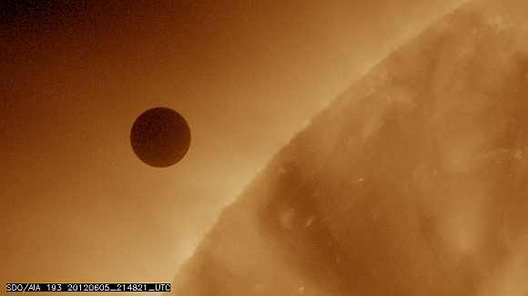 A NASA image shows the planet Venus at the start of its transit of the sun