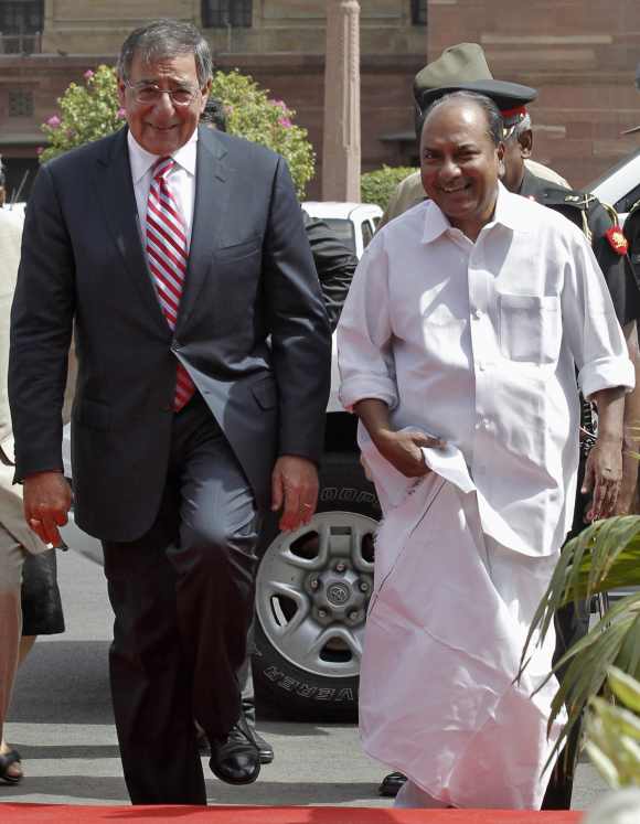 US Defence Secretary Leon Panetta arrives with Defence Minister A K Antony to attend his ceremonial reception in New Delhi June 6
