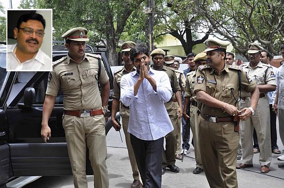 YSR Congress chief Jaganmohan Reddy greets his supporters outside the Nampally criminal court complex. Inset: YSR spokesperson Ambati Rambabu