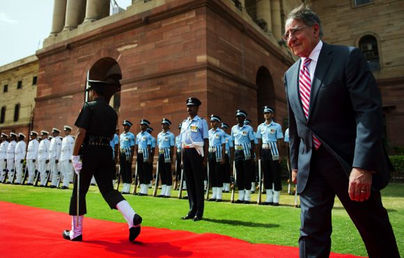 US Defence Secretary Leon Panetta inspects Indian troops during a ceremony in New Delhi on June 6