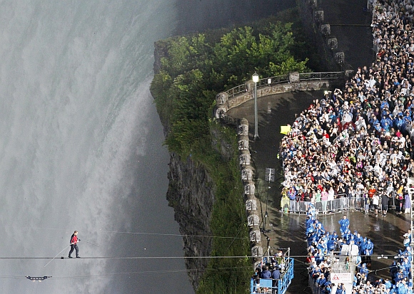 Wallenda walks the high wire