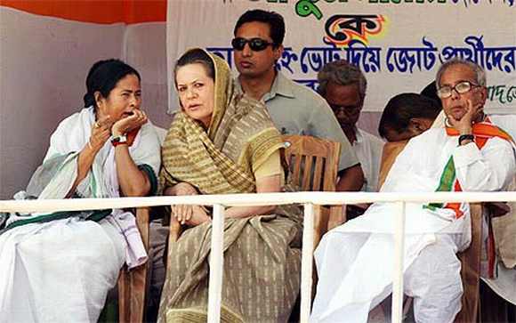 Banerjee with Congress President Sonia Gandhi and Finance Minister Pranab Mukherjee during a rally