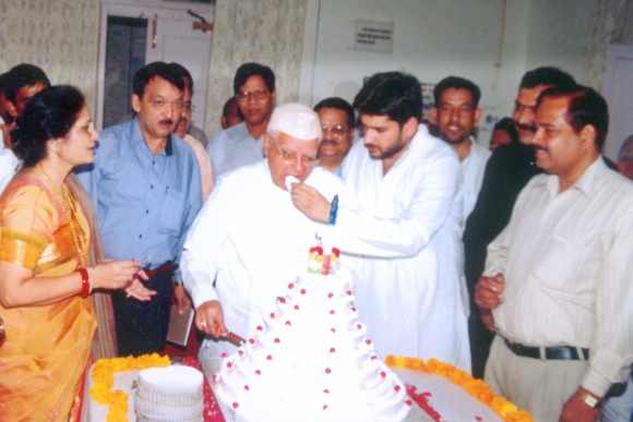 Shekhar feeds Tiwari a piece of cake on the latter's birthday