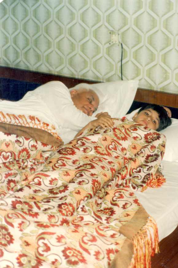 Tiwari sleeps as a teenaged Rohit Shekhar looks on