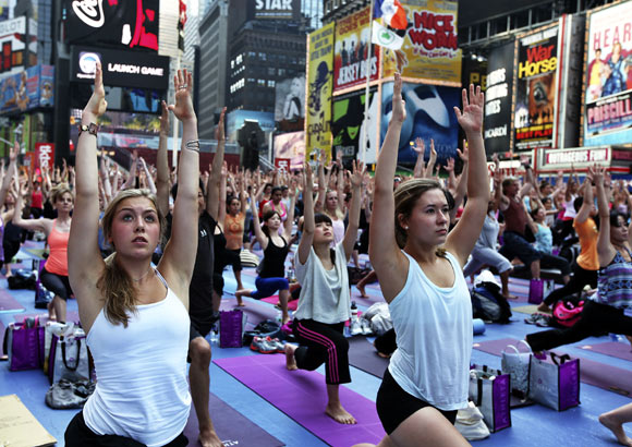 New Yorkers transform Times Square into yoga village