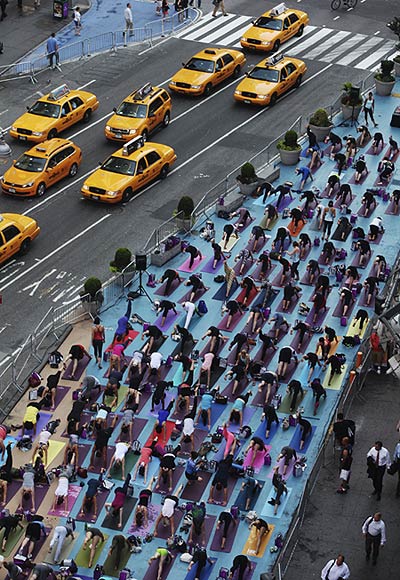 New Yorkers transform Times Square into yoga village
