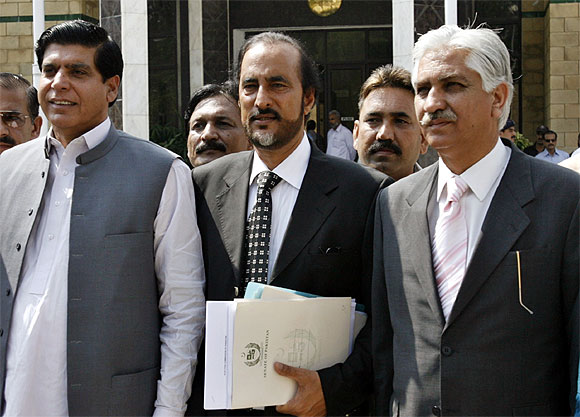 Members of the Pakistan People's Party (L-R) Raja Pervez Ashraf, Babar Awan and Nayyar Bokhari