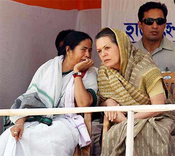 Banerjee interacts with Congress President Sonia Gandhi duringa a rally
