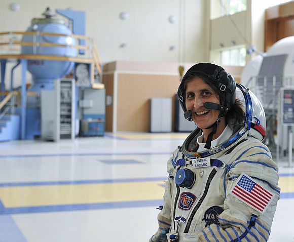 Sunita Williams smiles during a training exercise at the Star City space centre outside Moscow.