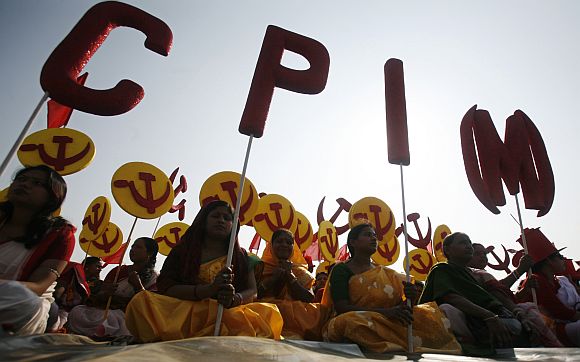 Supporters of CPI-M attend a public rally at Agartala