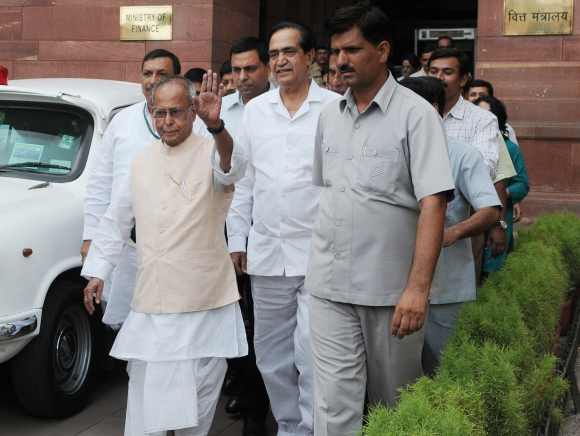 Pranab Mukherjee leaves for PM's house to submit his resignation as finance minister, in New Delhi on Tuesday