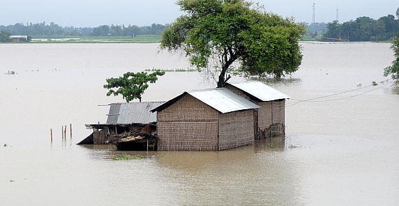 Submerged houses at Ashigarh village in Morigoan district, about 80 Km from Guwahati