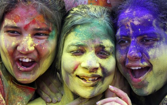 HOLI HAI!! Colourful images from across the world