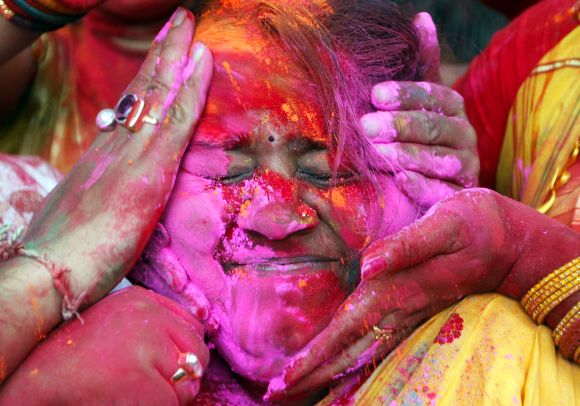 HOLI HAI!! Colourful images from across the world