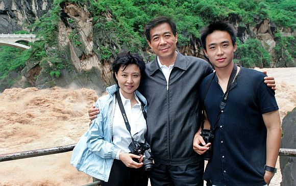 Bo Xilai with his wife Gu Kailai, who has been charged with murder, and his son Bo Guagua, currently a student at Harvard, whose lifestyle has provoked controversy in China