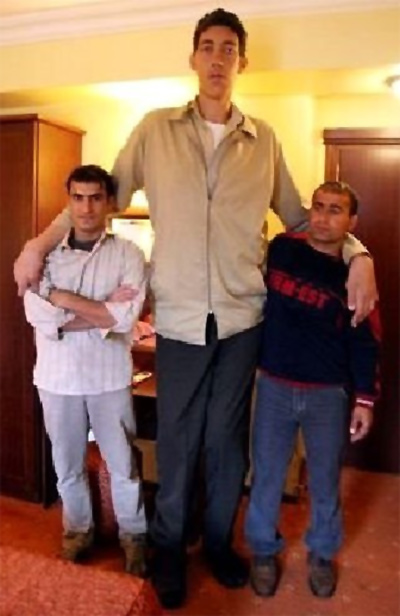 World's tallest man STOPS growing - Rediff.com News