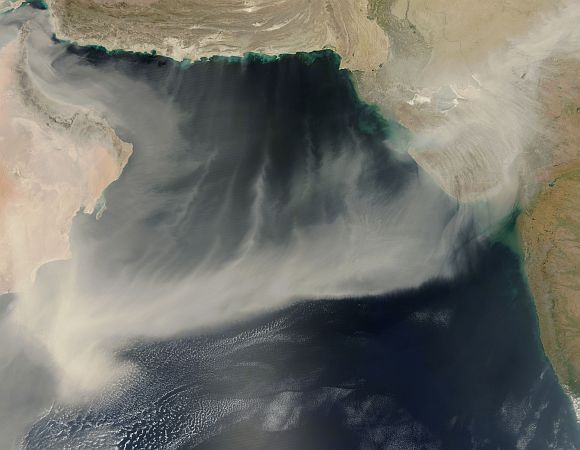 On March 20, 2012, a giant dust plume stretched across the Arabian Sea from the coast of Oman to India. The Moderate Resolution Imaging Spectroradiometer (MODIS) on NASA's Aqua satellite took this picture the same day