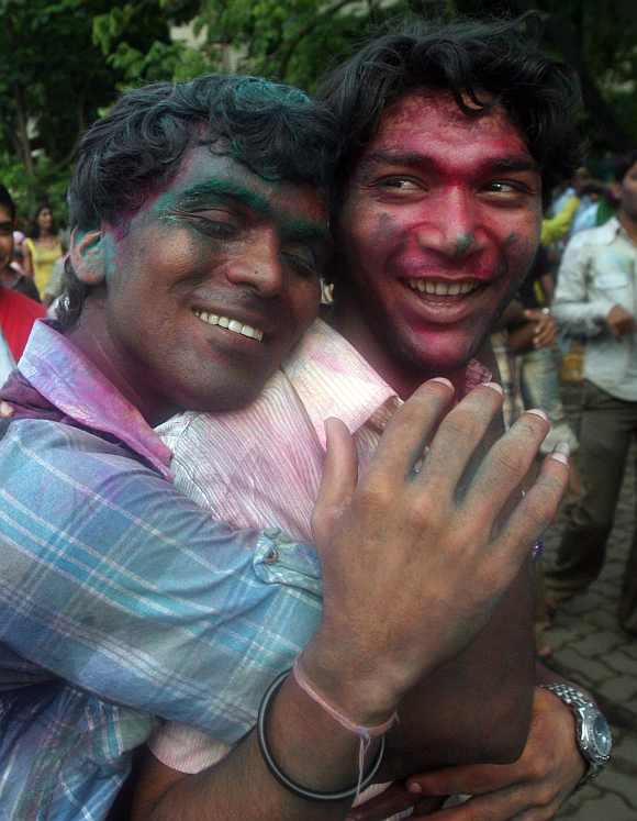 Men celebrate the Delhi court ruling over gay sex during a rally in Mumbai in July 2, 2009