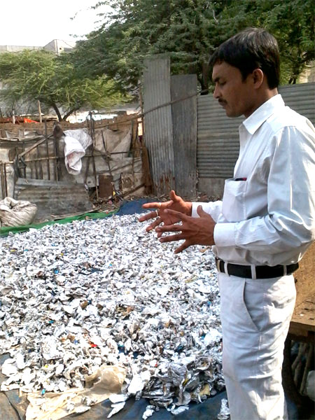 Prakash at a garbage collection and segregation centre near village Kotla in east Delhi