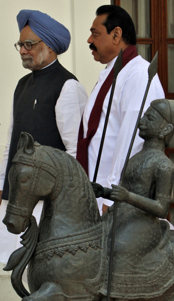 A file photo of Sri Lanka's President Mahinda Rajapakse with Prime Minister Manmohan Singh