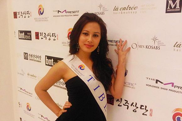 Miss Tibet 2011 Tenzin Yangkyi posing for the media in Incheon, South Korea
