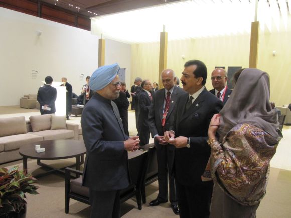 Prime Minister Manmohan Singh with Pakistan Prime Minister Yousaf Raza Gllani and Foreign Minister Hina Rabbani Khar at the Nuclear Security Summit in Seoul