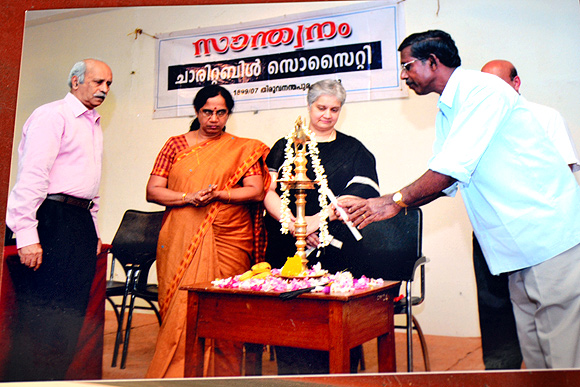 M S Mathews, president, Santhawnam Charitable Society; Sobha Koshy, Kerala's chief postmaster general, and S Babu at an event conducted by the Society