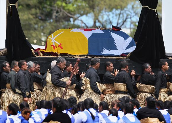 The late King George Tupou V is carried to the Royal Tomb during the state funeral held for King George Tupou V at Mala'ekula