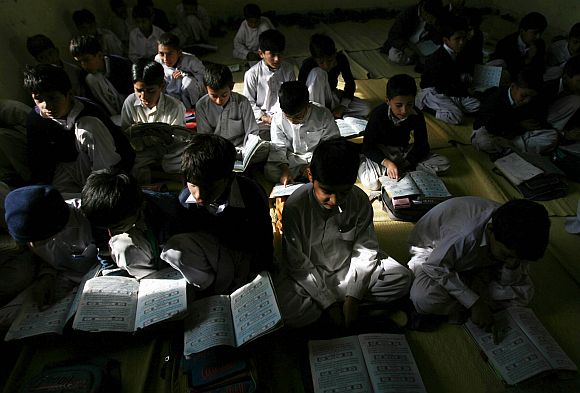 Students are pictured inside a classroom of a school in Jamaat-ud-Dawa charity's headquarters, known as the Markaz-e-Taiba in Muridke