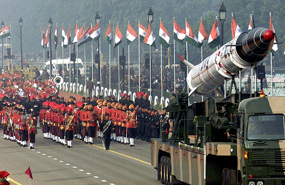 Soldiers roll out the Agni missile during rehearsal for the Republic Day parade