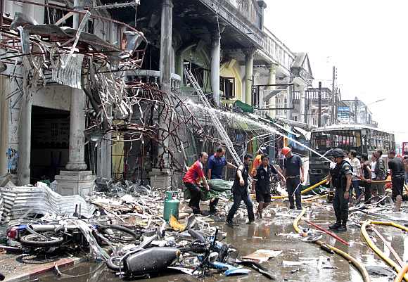 Deadly triple blasts rock south Thailand