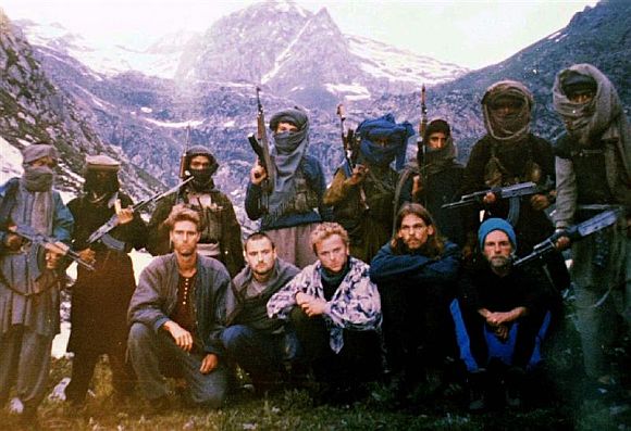 This picture was released by terrorists on July 15, 1995, in Srinagar showing the five western hostages. Hostages seated (left to right) are Keith Mangan (the UK), DrikHasert (Germany), Hans Christian Ostro (Norway), Paul Wells (the UK) and Donald Hutchings (US)