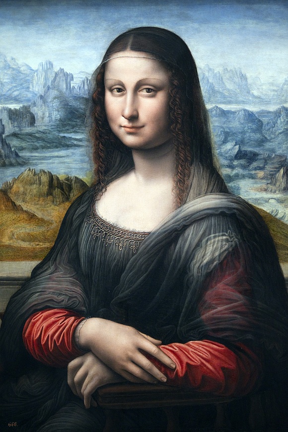A copy of Leonardo Da Vinci's famous Mona Lisa painting from Madrid's El Prado Museum is pictured at the Louvre museum in Paris