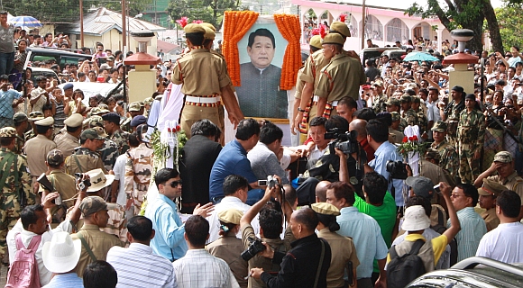 Supporters follow the body of Dorjee Khandu, the then Arunachal Pradesh CM, during a procession at Itanagar May 5, 2011